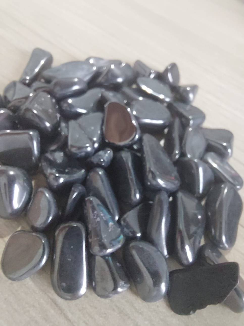 Hematita natural rolada pequena energizada para aterramento e proteção diária